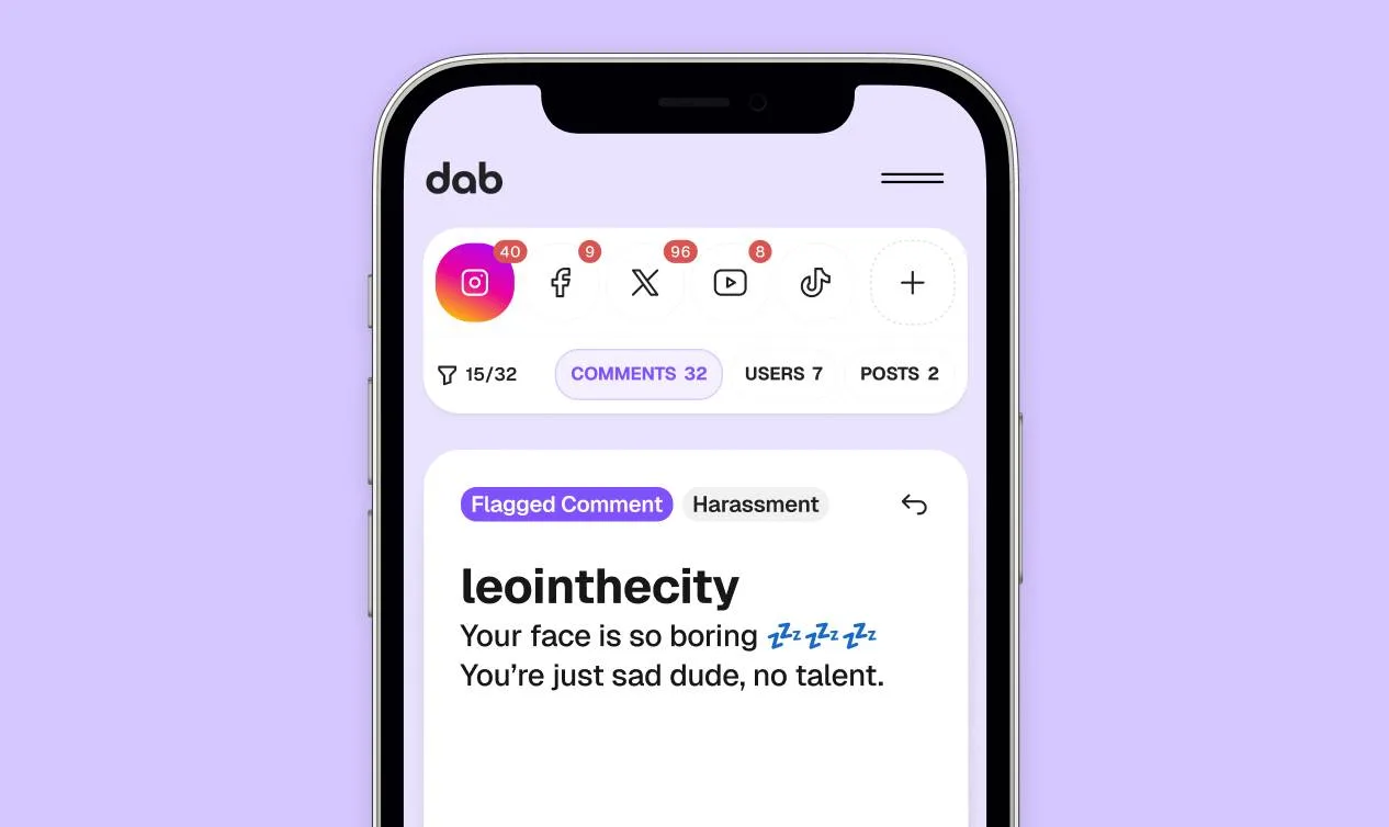 dab mobile app displaying a comment flagged for harassment.